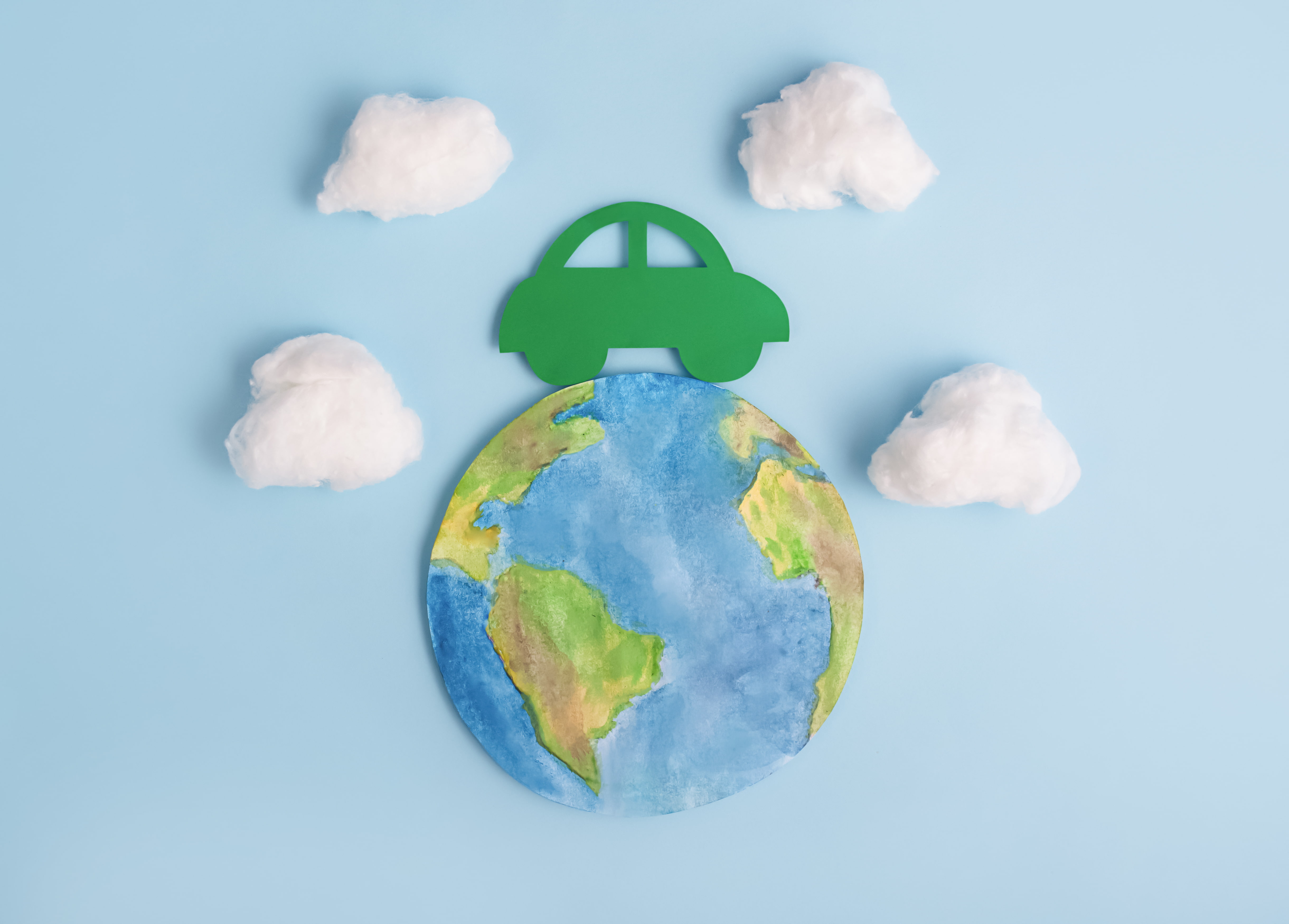 planete terre avec voiture roulant dessus